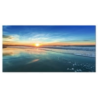 DesignArt 'plava morska obala s dalekim zalaskom sunca' Seascape Canvas Art Print